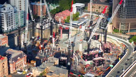 Queen's-Wharf-Under-Construction-With-Tower-Cranes-And-Traffic-From-Above-In-QLD,-Australia