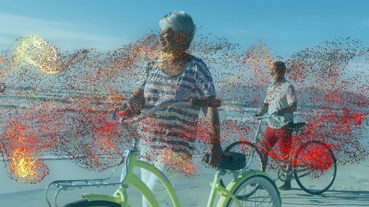 Couple walking bicycles along beach shoreline, showing health marketing chart and wave icons
