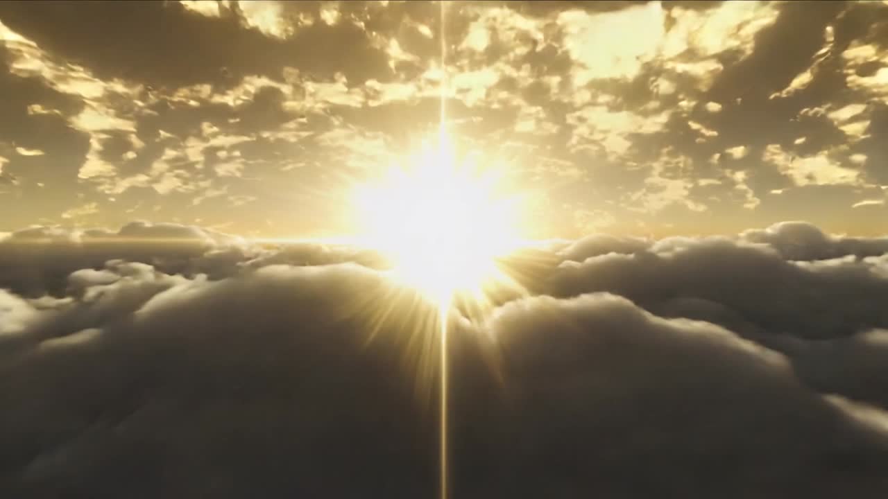 Sole che sorge sull'orizzonte, illuminando le nuvole, producendo un bagliore, poi un effetto di sovraesposizione e infine un effetto a stella, per il cinema.