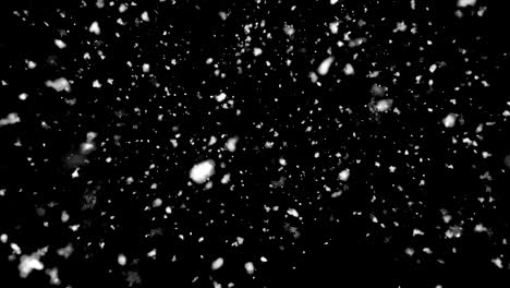 camera front snow snowfall. falling realistic snowflakes on a black background