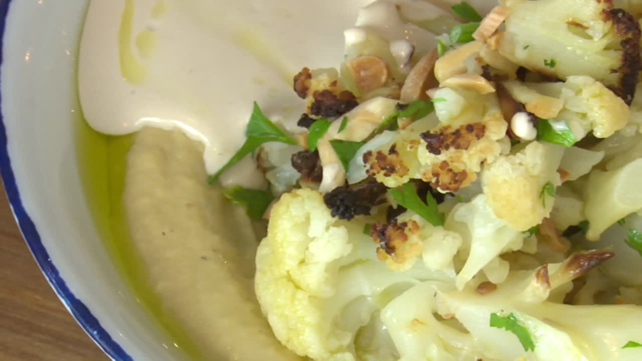 Roasted Cauliflower with Hummus and Tahini