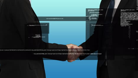 data processing over mid section of businessman and businesswoman shaking hands