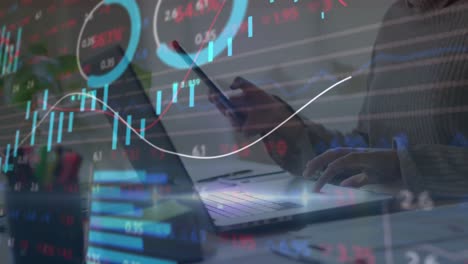 animation of graphs and trading board over midsection of caucasian woman using laptop and cellphone