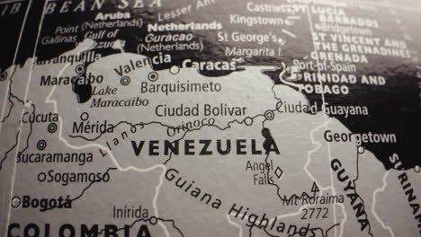 close-up view of a world globe, focusing on venezuela and surrounding south american countries
