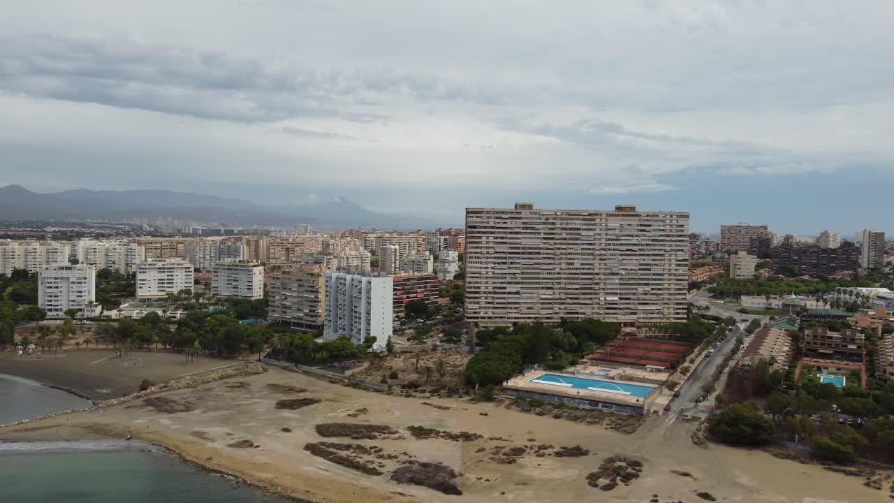 Aerial View of Coastal City with High-Rise Buildings
