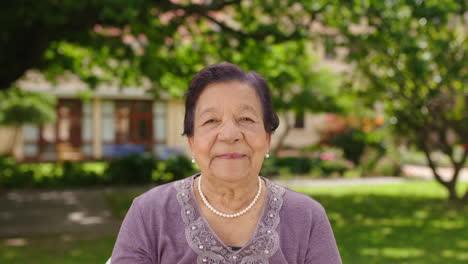 Senior-woman,-retirement-portrait-and-park