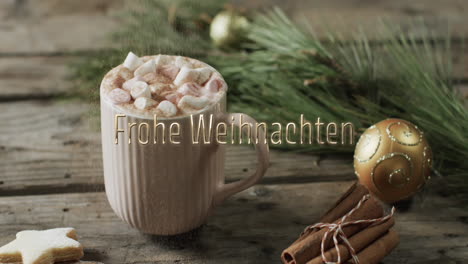 frohe weihnachten text over hot chocolate with marshmallows and christmas decorations on wood