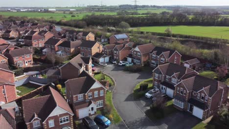 Aerial-backward-over-Normanton-neighborhood-and-houses