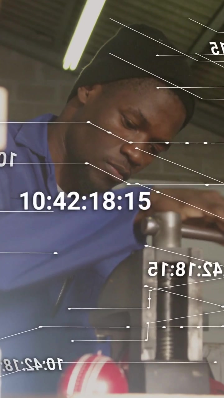 Vertical video: Industrial tech placing part in vice, tightening handle while HUD readouts updating