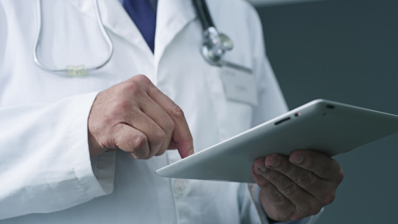 Doctor using tablet