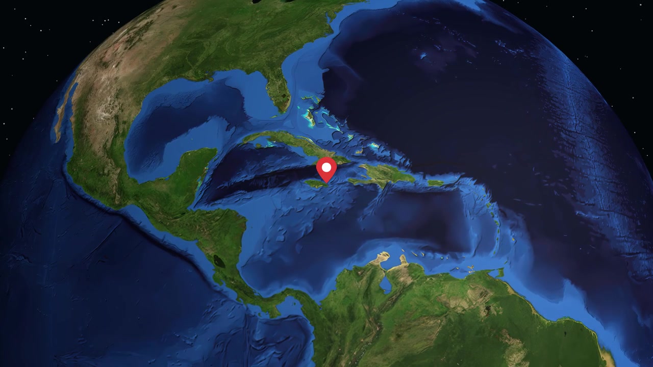 Digital globe rotates and zooms into Jamaica, highlighting Port Antonio with a red location pin