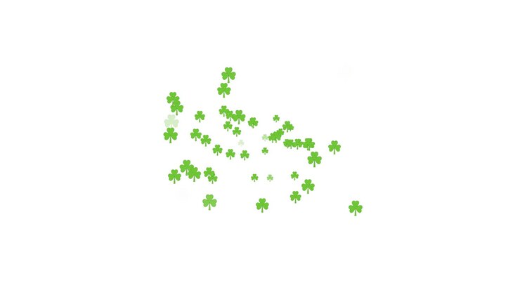 Molteplici foglie di trifoglio fluttuanti e scie di luce verde su sfondo bianco