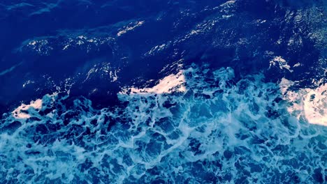 Down-View-Of-Flow-Of-Waves-Due-to-Ferry-Boat-Sailing-In-Sea,-Croatia