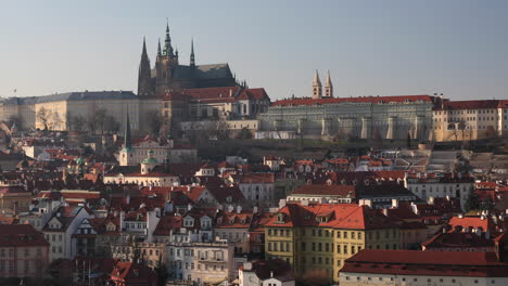 looking over the rooftops of prague towards the saint vitus cathedral, czech republic