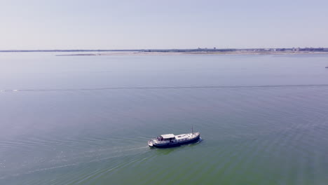 breathtaking aerial view showcasing the beauty of dutch waterways and classic boat design