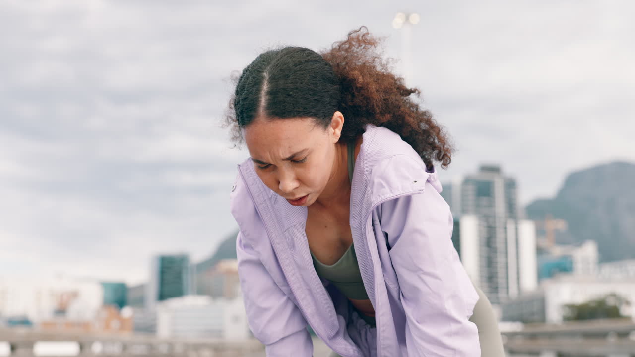 Tired Runner Taking a Break in the City