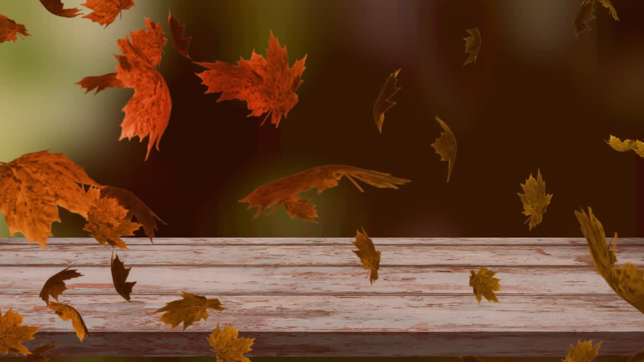 animación digital de múltiples hojas de otoño flotando sobre la superficie de madera contra el bosque