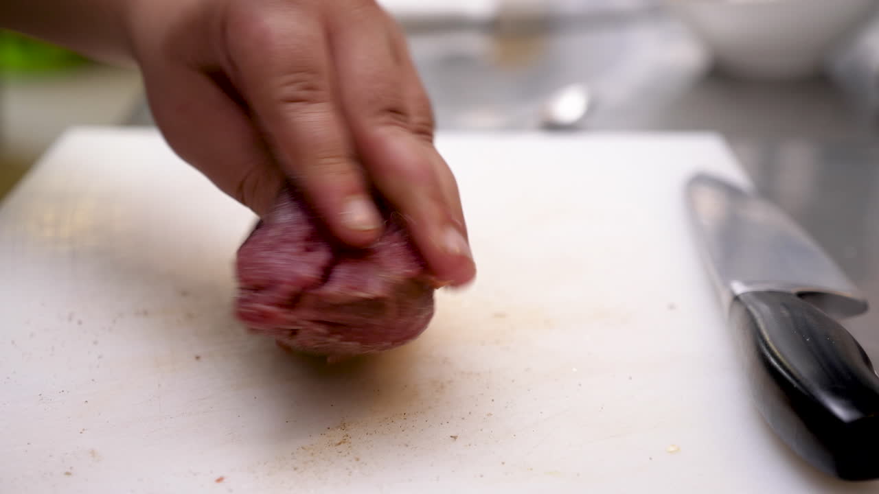 Preparing Beef on a Cutting Board