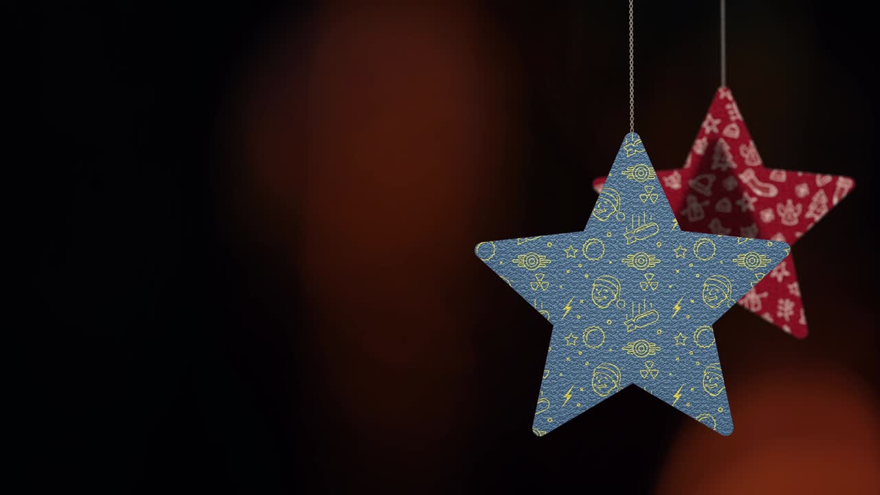 los adornos de las estrellas de navidad se mueven en el fondo de bokeh.