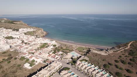 aerial of waterfront holiday homes in burgau, algarve, portugal