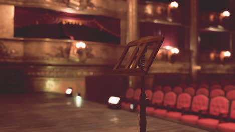 empty stage with music stand in theater