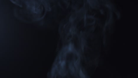 fondo negro de 4k de partículas, polvo y humo en movimiento