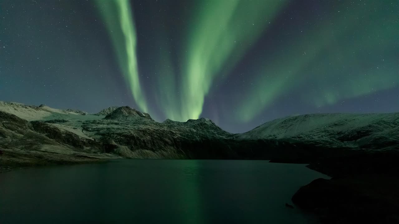 Aurora Borealis Dance Above Glacier in the Lyngen Alps, Norway