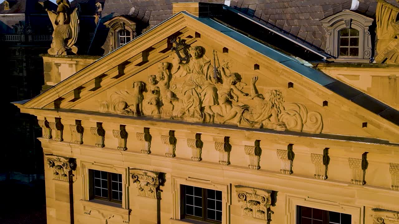 4K Aerial Drone Video of the Detailed Stucco Relief Decoration on the Gables of the Historic Residence Palace in Würzburg, Germany