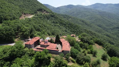 rentina monastery in agrafa greece, aerial view of historic orthodox monastery surrounded by forest and remote natural landscape, point of interest shot