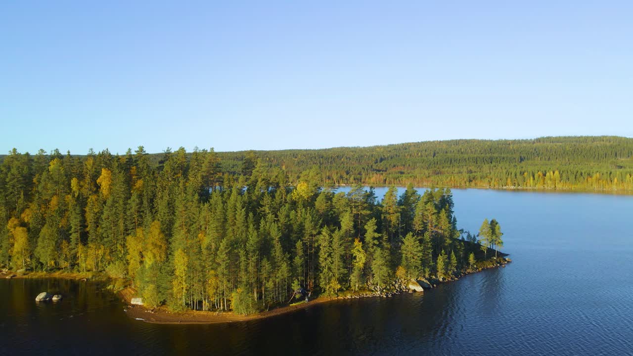 Aerial View of a Scenic Island Lake in Autumn