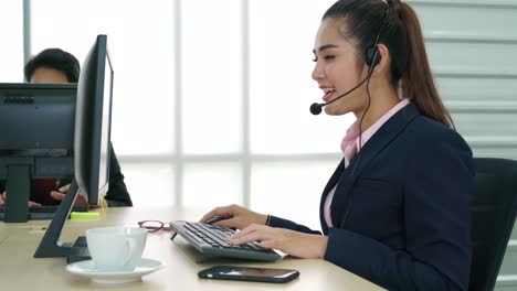 business people wearing headset working in office