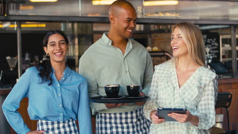 portrait of multi-cultural staff team working in restaurant or coffee shop 2