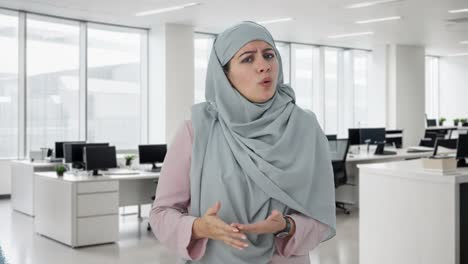 angry muslim businesswoman shouting on someone