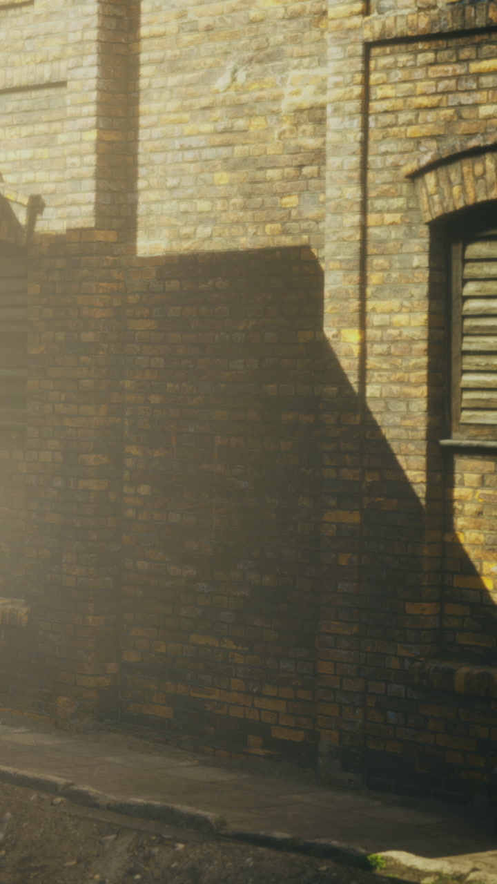 Evening sunlight dances on aged brick walls of a quiet alleyway
