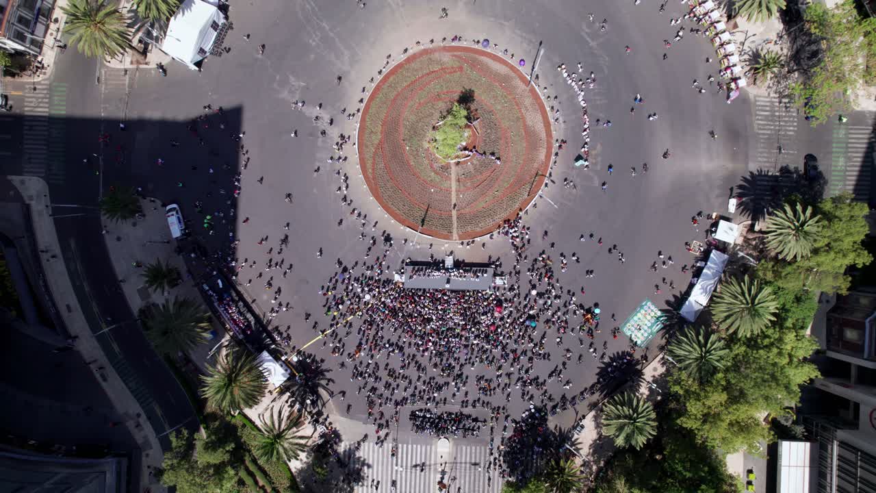 Aerial Birds Eye View Of Glorieta De La Palma Roundabout With Crowds To See The New Ahuehuete Tree Guardian of Missing Persons Mexico City. Pedestal Up