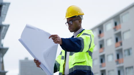 Black-man,-architect-and-planning-in-construction