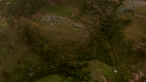 4K-daytime-right-before-sunset-aerial-drone-view-over-the-northern-part-of-Cusco-showing-the-hills-where-all-ruins-are-located