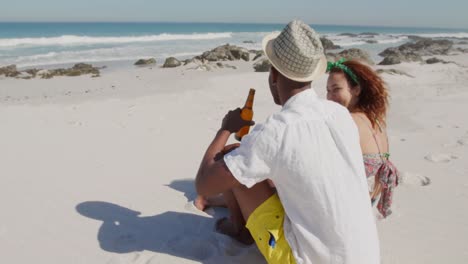 young couple by the sea