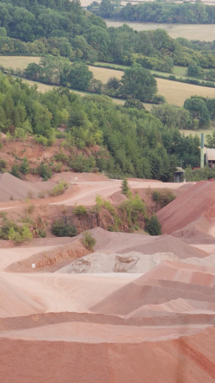 Vertical Video Slow Pan Across Industrial Quarry Processing Plant for Raw Materials to Use in Road Building and Construction Industry