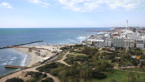 tel aviv, israel aerial view of hilton beach, mediterranean coastline and spiegel park