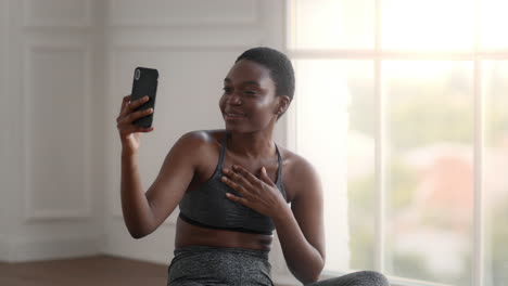 woman streaming online workout video