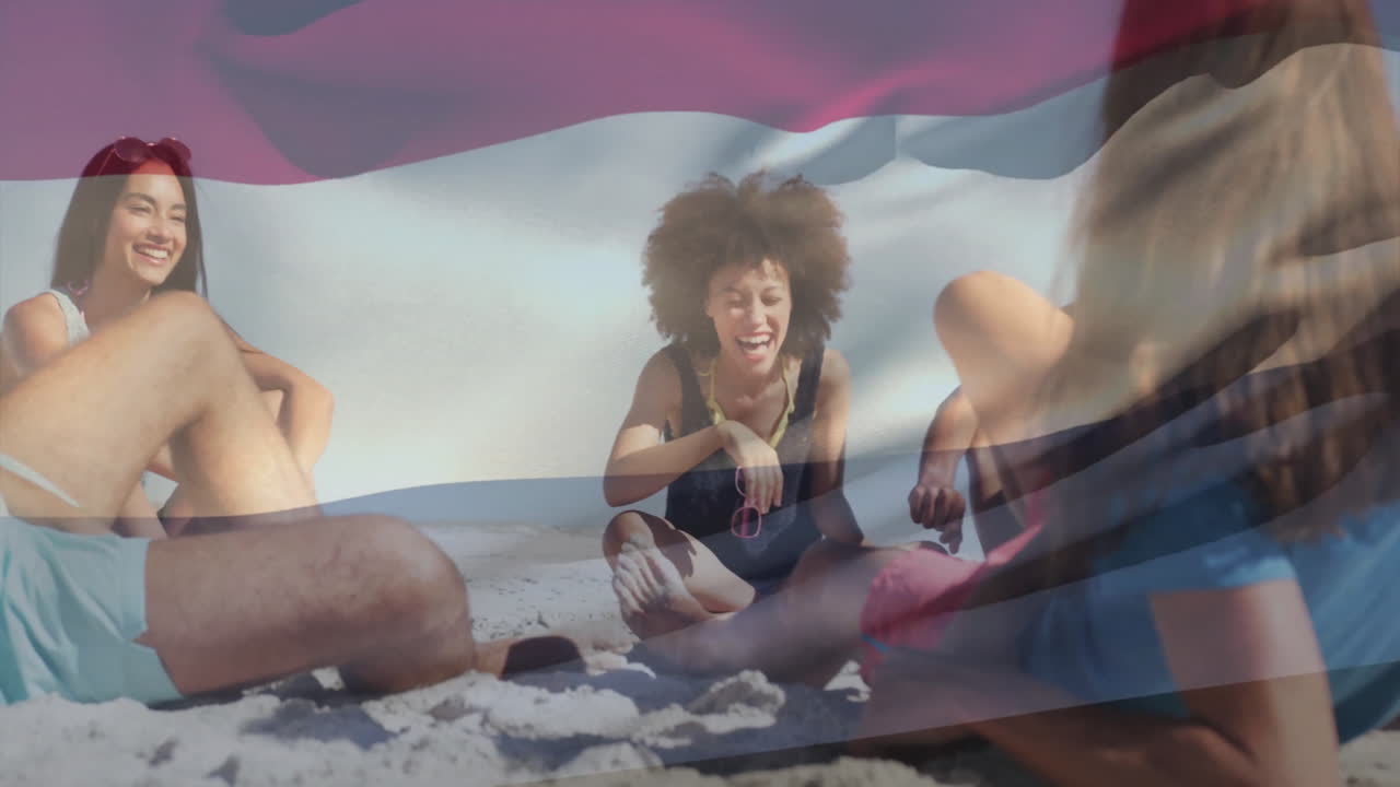 анимация с флагом трансгендерной гордости над друзьями, сидящими и смеящимися на пляже