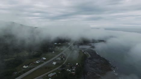 White-Clouds-And-Fog-Over-Chic-Choc-Mountains,-Village-At-Gaspe-Peninsula-And-The-Saint-Lawrence-River-At-Early-Morning-In-Quebec,-Canada