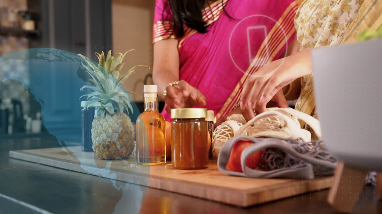 Mom lifting bottle while daughter packing jars on board, globe overlay guiding hands for food promo