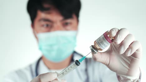 doctor administering a covid-19 vaccine