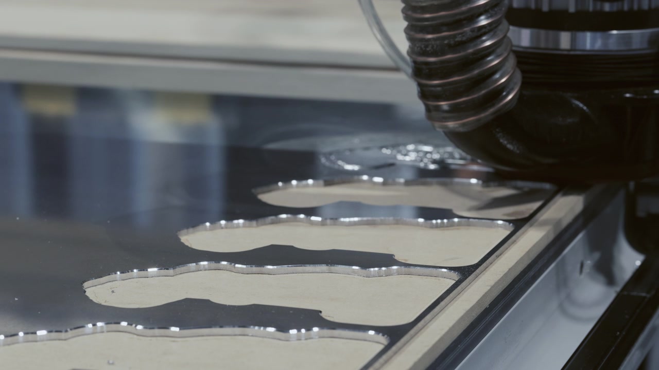 CNC Router Cutting Complex Shapes from Metal Sheet