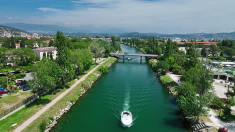 Riverside-Beauty-boat-cruising-on-La-Siagne-Aerial-View-in-Mandelieu