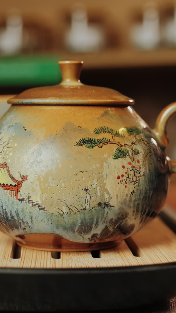 Close-up of a decorated ceramic tea pot