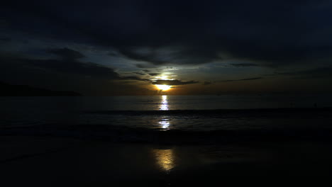 standing and looking at the sunrise in da nang in the morning.