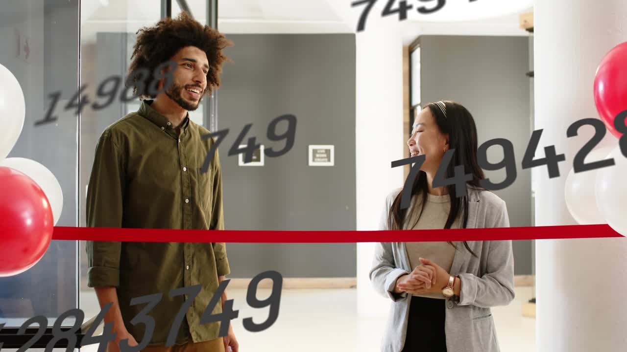 Two hosts leading talk behind red ribbon, lobby balloons for office opening, numbers drifting front